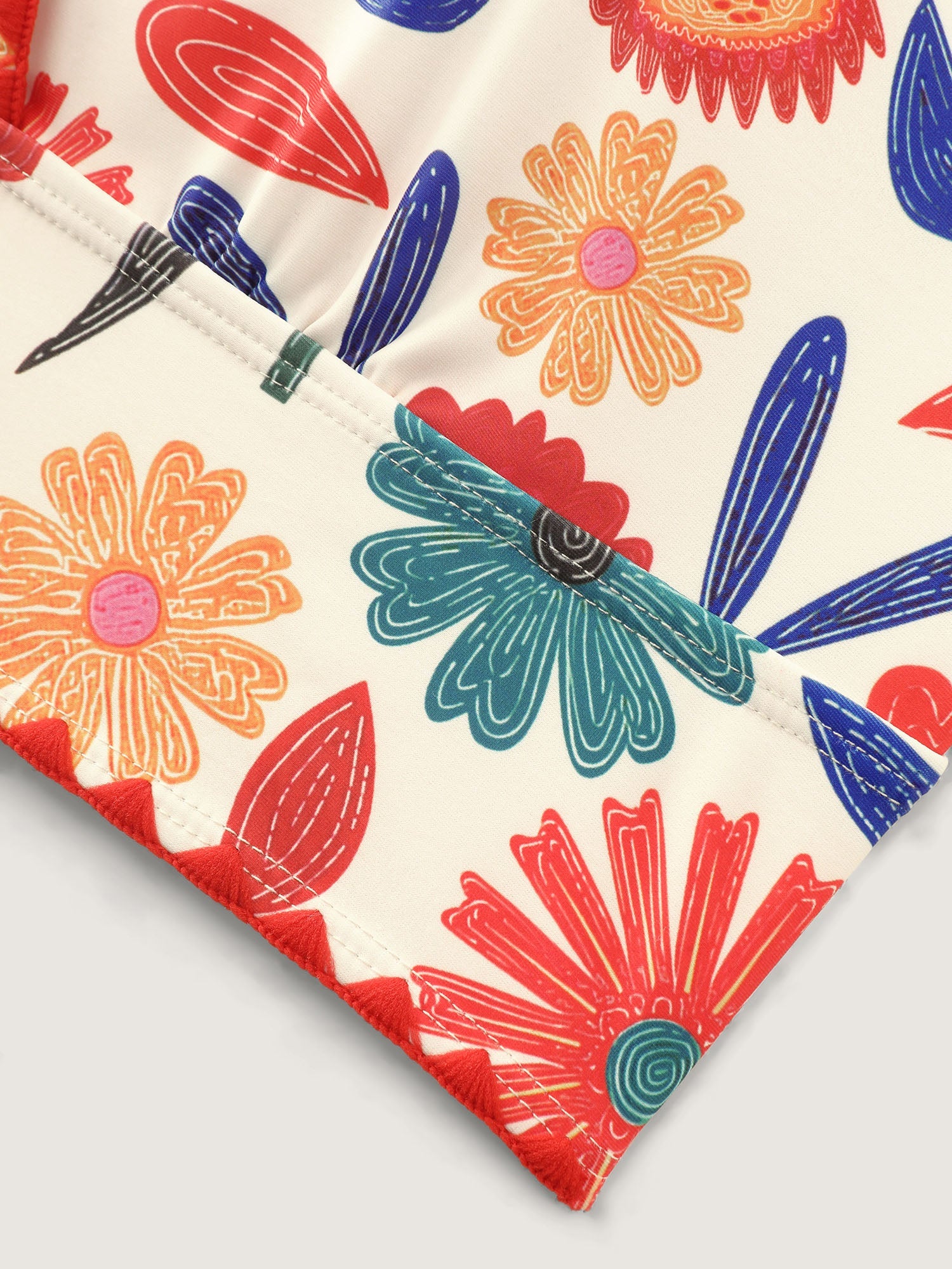 Playful Floral Print Embroidered Trim Bikini Top